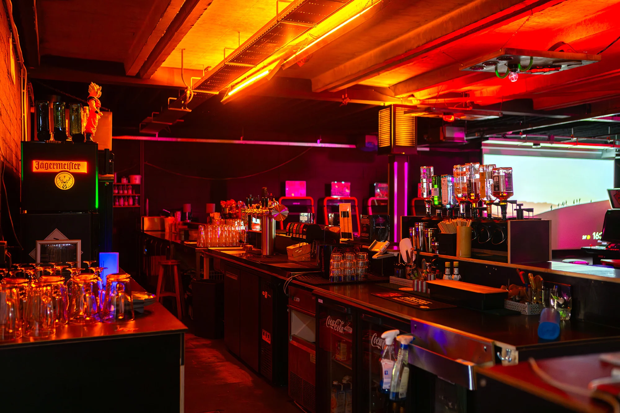 The Blast Galaxy bar with orange lighting and seating